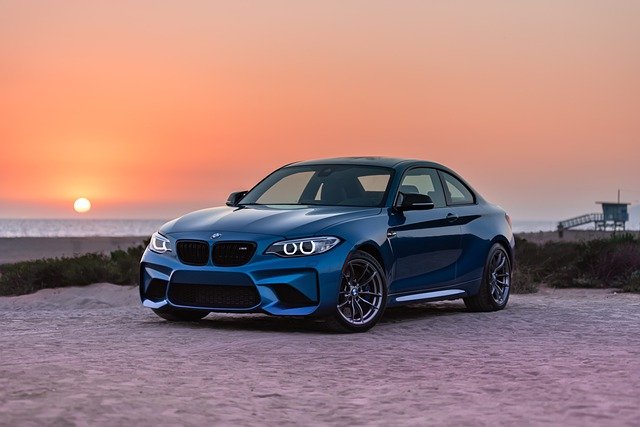 bmw shot at golden hour on the beach