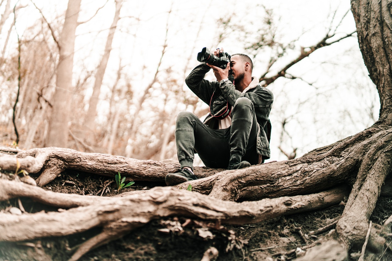 photographer shooting in forest