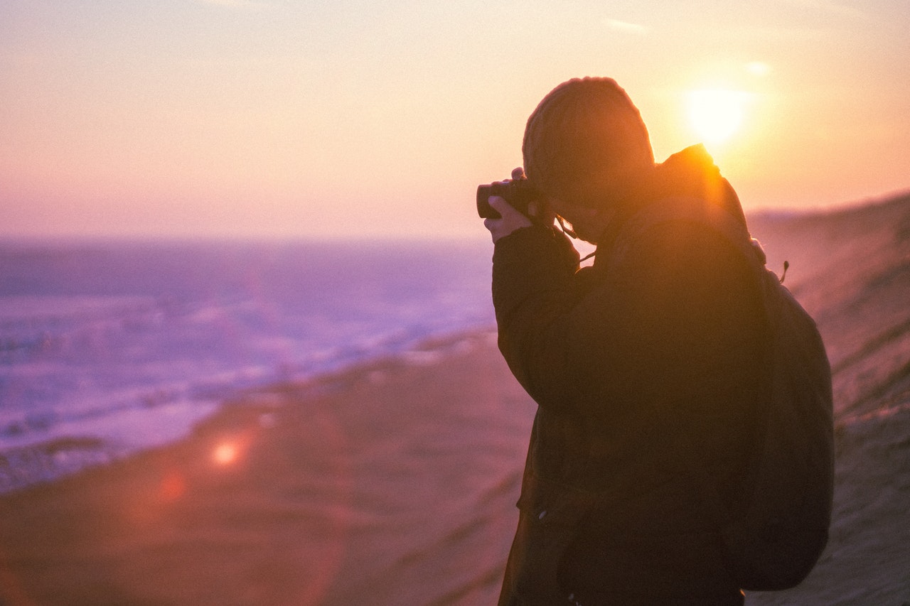 photographer taking a photo during dawn