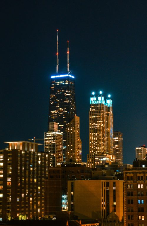 High Rise Building At Night Time