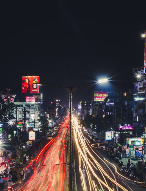 Time Lapse Photo of Cars Passing By Road During Nighttime